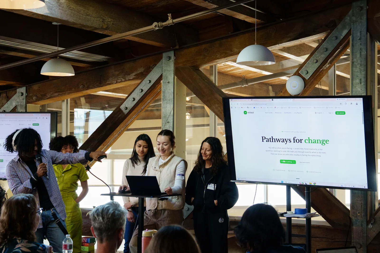 A Seattle 2026 team presenting its project to the room